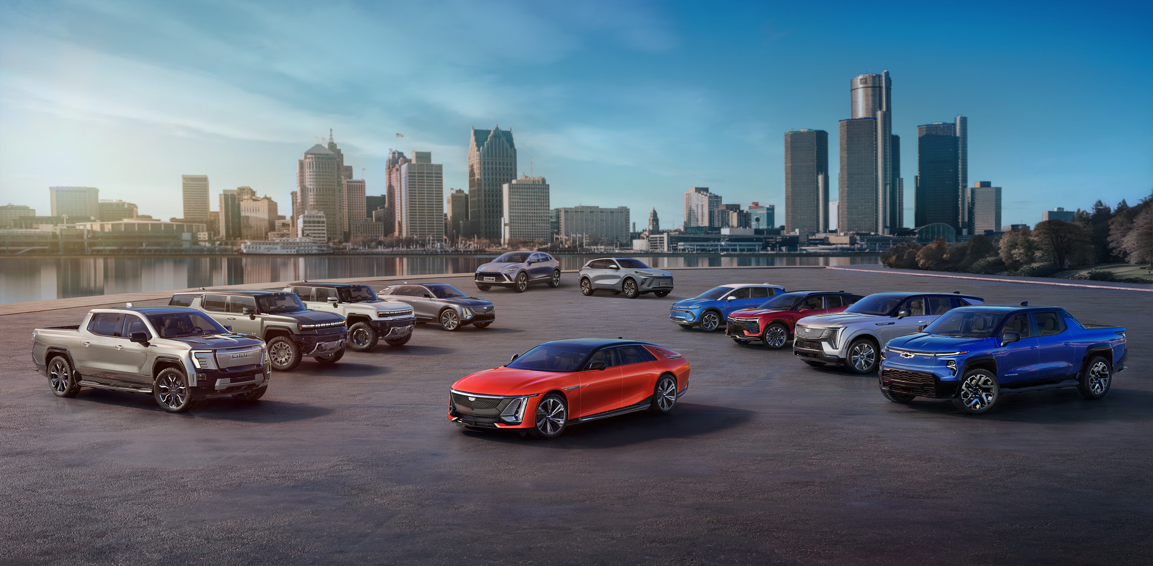 GM Electric Vehicle Lineup Parked Together With City Skyline In Background